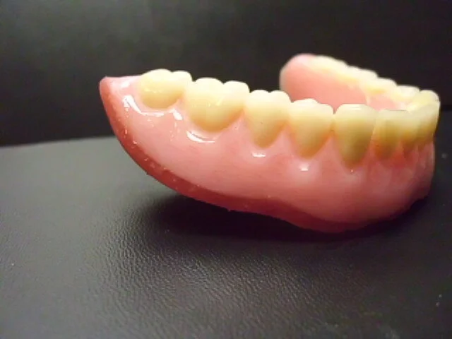 Soft liner for a comfortable lower denture